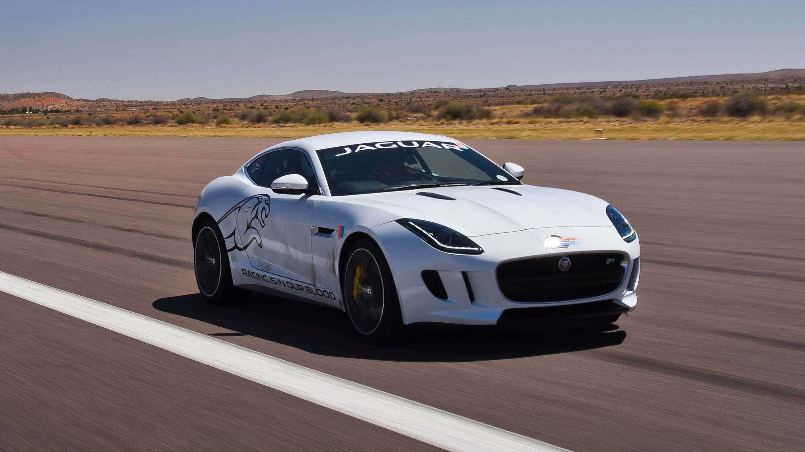 Jaguar F-TYPE running on racing track